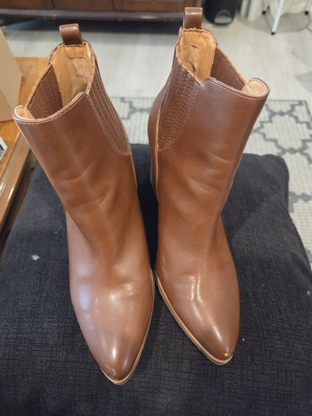 Women's brown pointed-toe boots. Indigo Rd